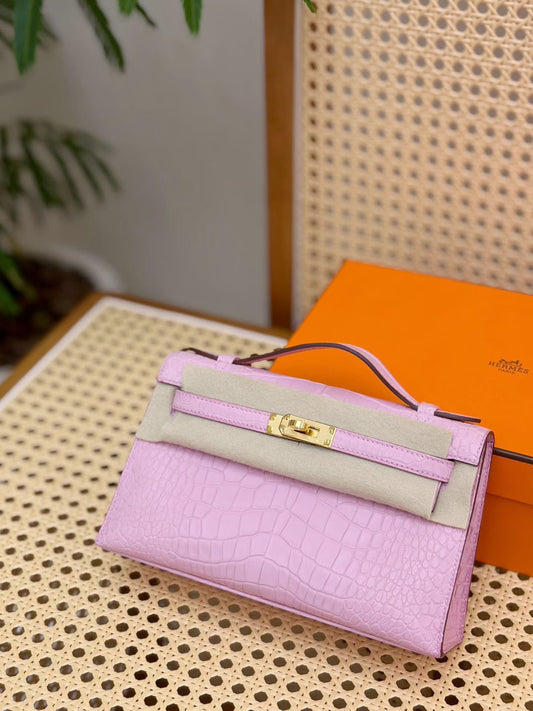 Hermès Kelly Pochette Pink Bubblegum Matte alligator Leather Gold Hardware