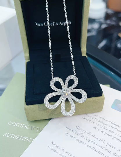 Van Cleef 
Arpels White Gold and Diamond Flowerlace Pendant Necklace