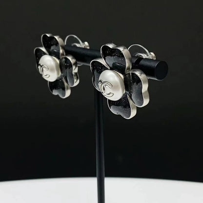 Chanel 2022 black resin four-leaf clover earrings