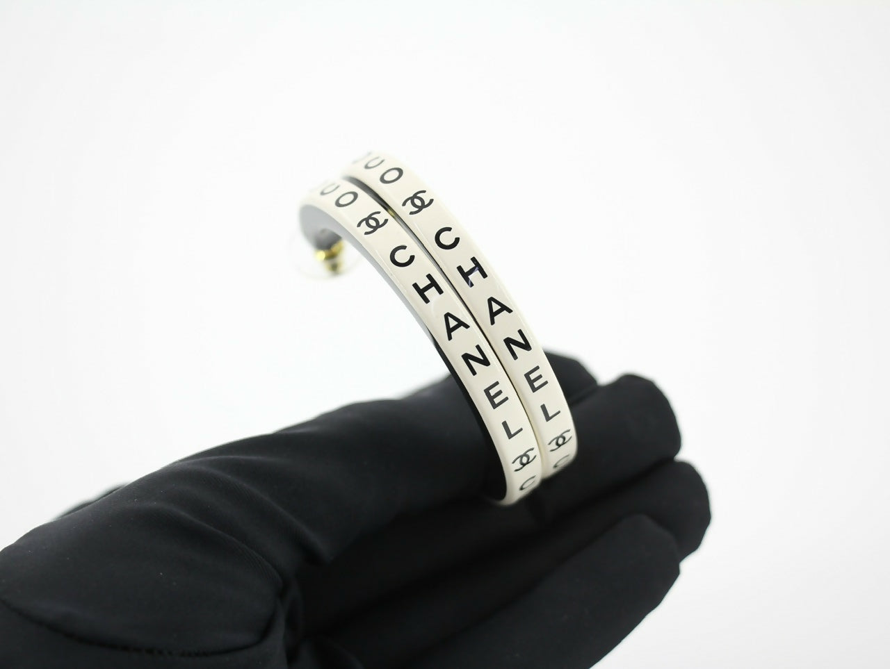 Chanel B22S Resin White Curved COCO Motif Hoop Stud Earrings