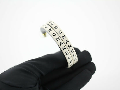 Chanel B22S Resin White Curved COCO Motif Hoop Stud Earrings