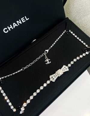 Chanel 23S bow diamond pearl double C waist chain