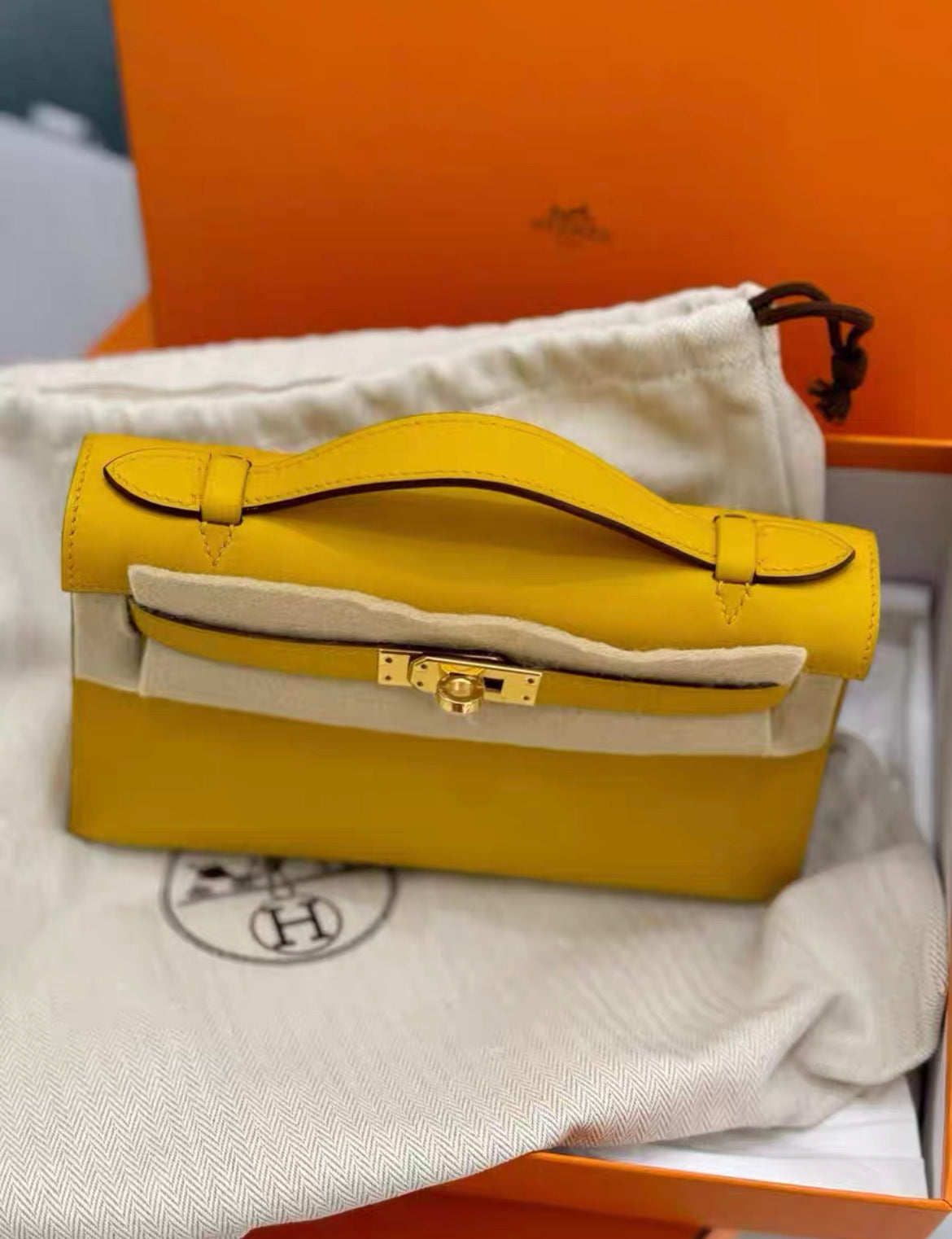 Hermes Kelly Pochette Jaune Ambre Swift Gold Hardware