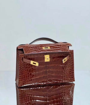 Hermes Kelly Pochette Miel shiny alligator gold hardware