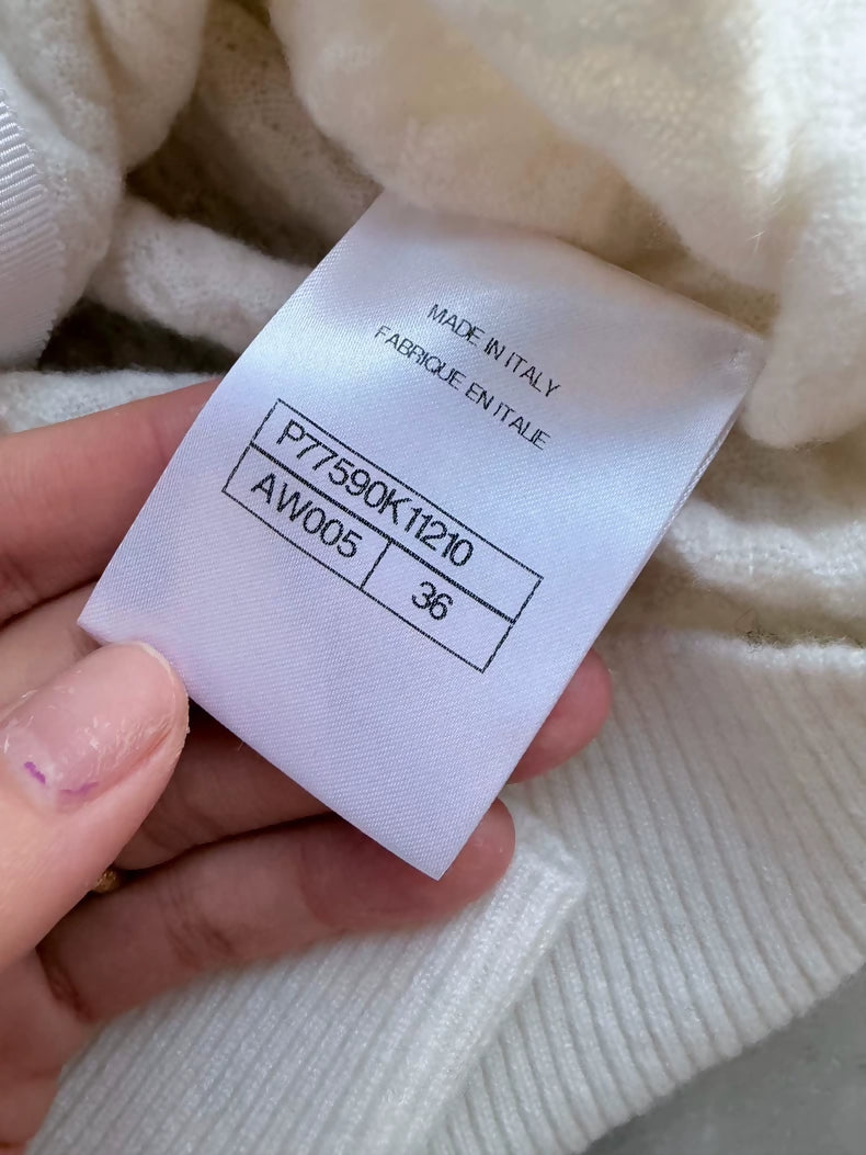 Chanel 24A white cashmere cardigan with charms buttons
