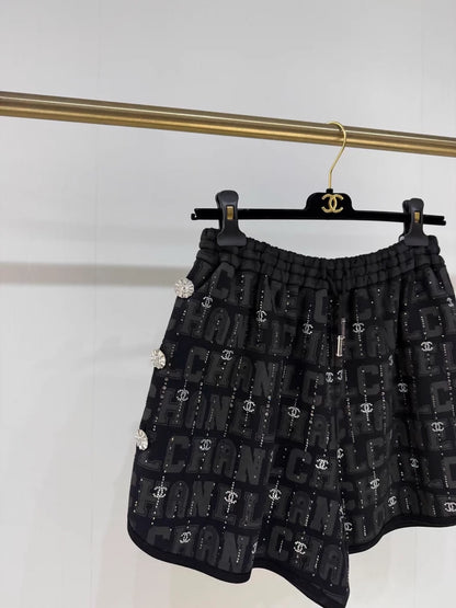 Chanel 23c black rhinestone logo shorts
