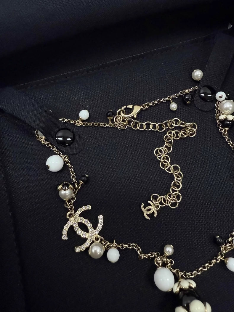Chanel exquisite black and white enamel floral choker necklace