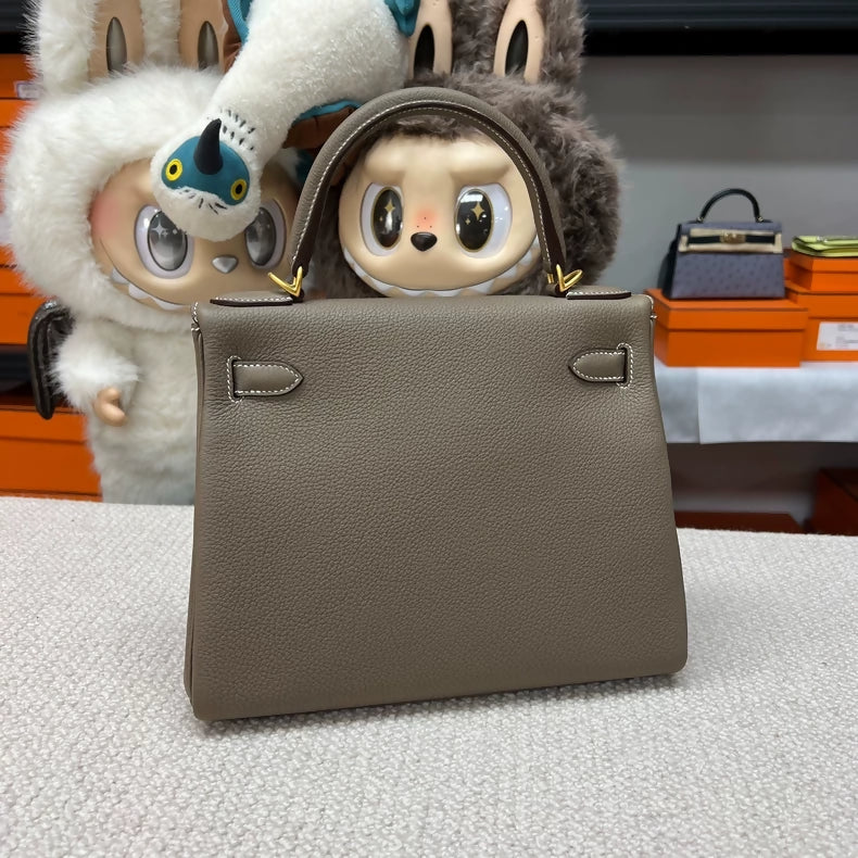 Hermès Kelly 28 in Gris Elephant Togo leather with brushed gold hardware
