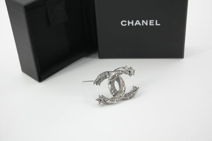 Chanel C21S Rhinestone Metallic Silver Star Twisted Brooch