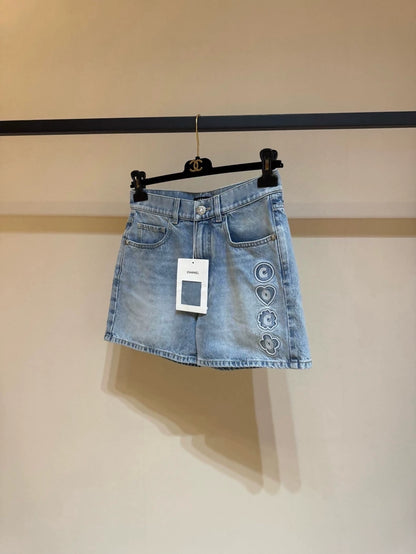 Chanel 25M blue distressed heart embroidered denim shorts