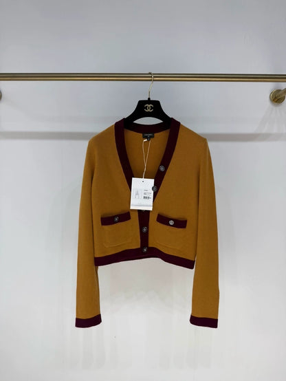Chanel 21K orange cashmere cardigan