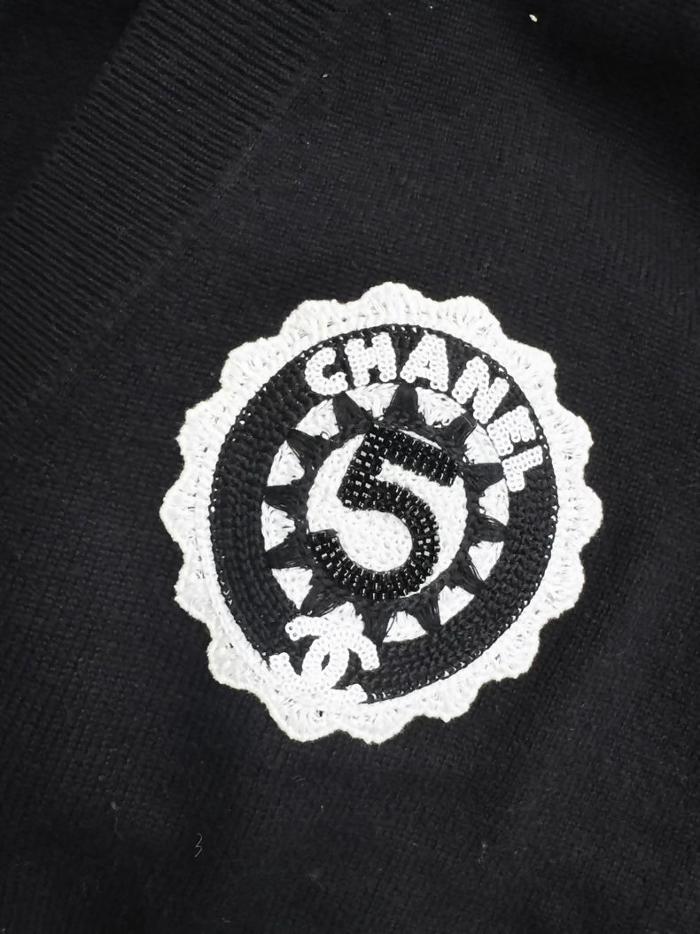 Chanel 23C Black Knit Cardigan with Embroidered Number 5 Badge