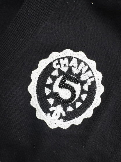 Chanel 23C Black Knit Cardigan with Embroidered Number 5 Badge