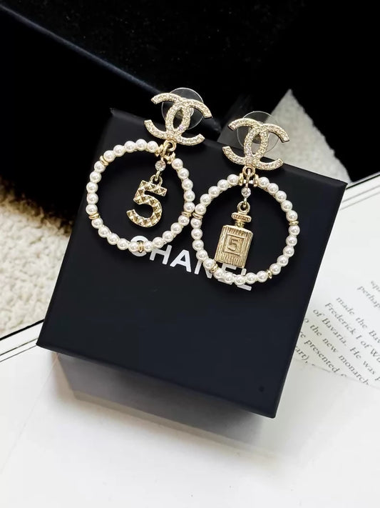 Chanel gold circle pearl pendant earrings