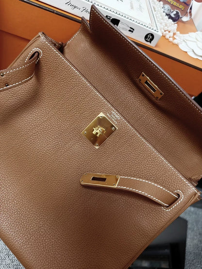 Hermès Kelly 28 golden brown Togo leather gold hardware