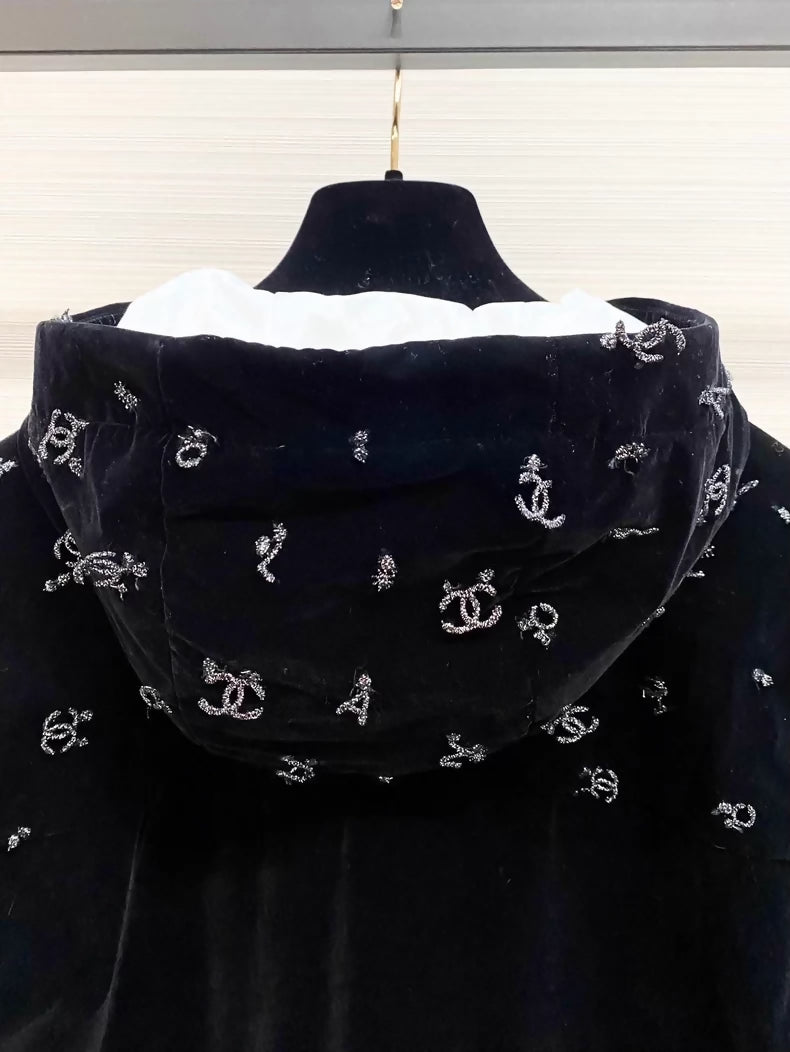 Chanel ski collection, velvet embroidered logo hooded down jacket