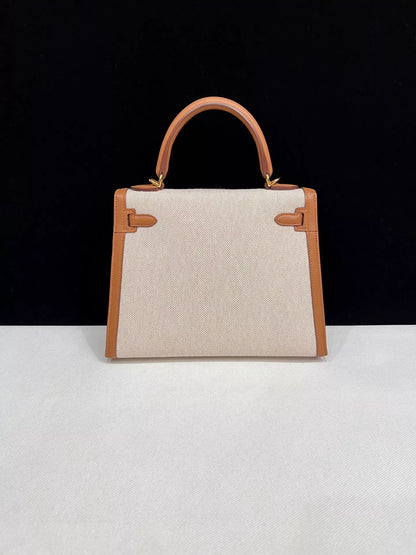 Hermes Kelly 25 Canvas with gold/brown swift leather and gold hardware