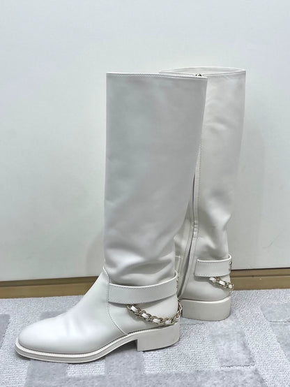 Chanel white boots with chains