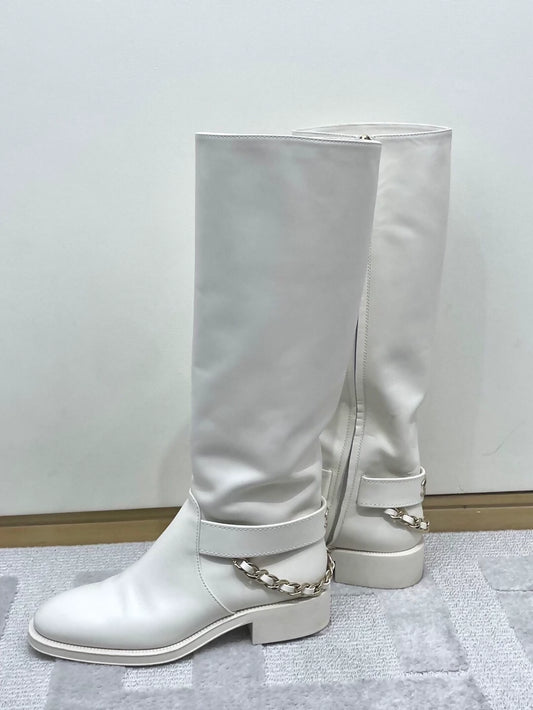 Chanel white boots with chains