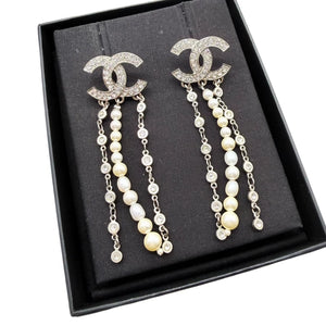 CHANEL tassel pearl pendant earrings