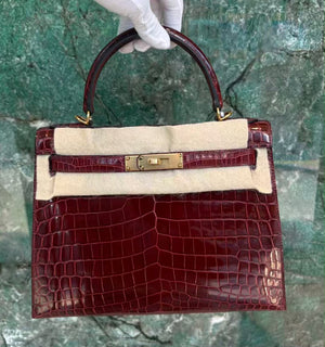 Hermes Kelly 28 Bordeaux shiny niloticus gold hardware