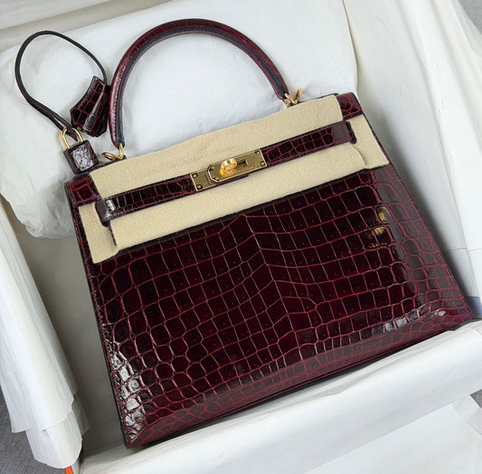 Hermes kelly 28 Bordeaux Shiny Porosus crocodile leather gold hardware