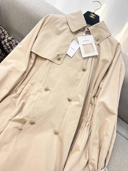 Chanel 25B trench coat with CC logo print