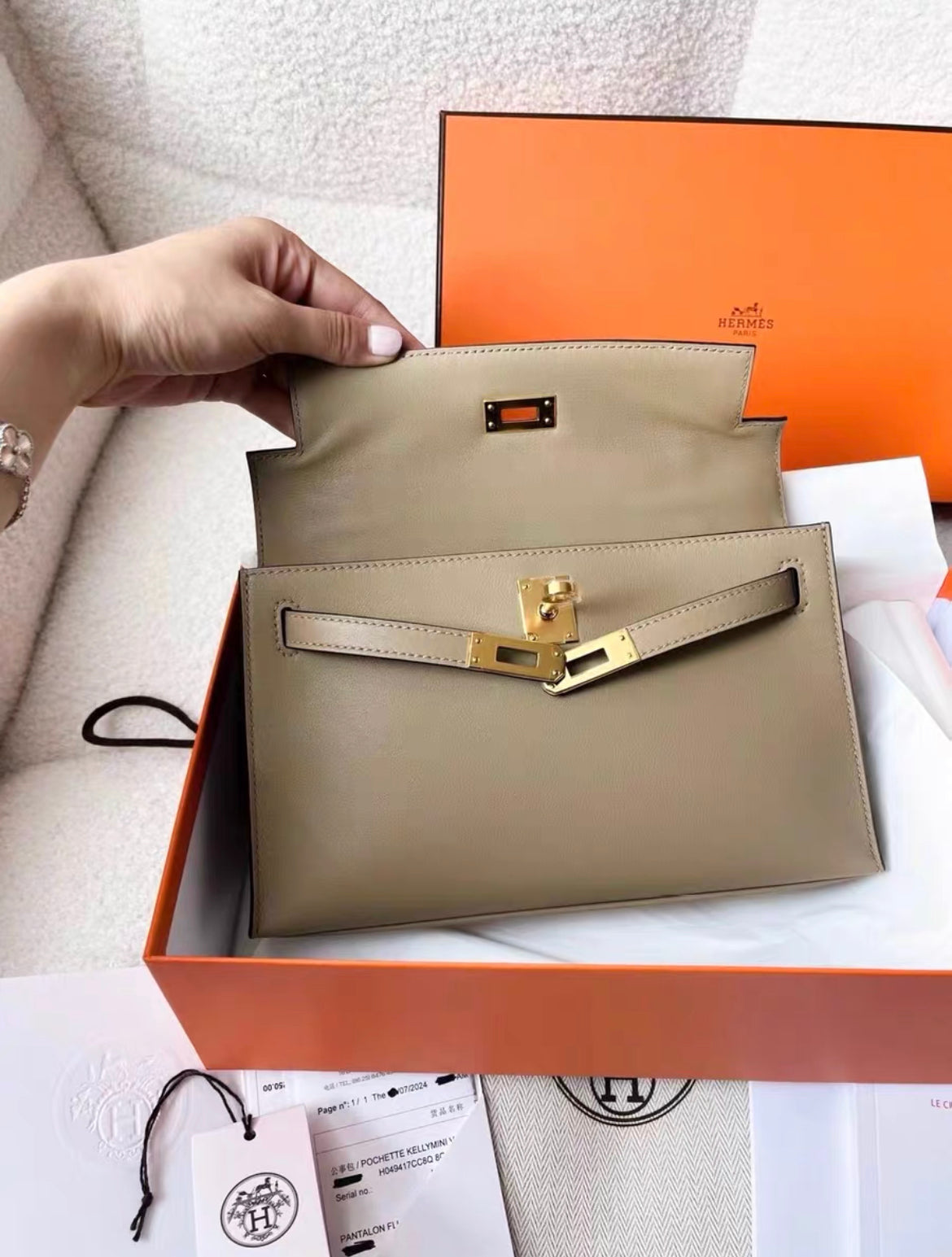 Hermès Kelly Pochette Beige Marfa Swift Gold Hardware