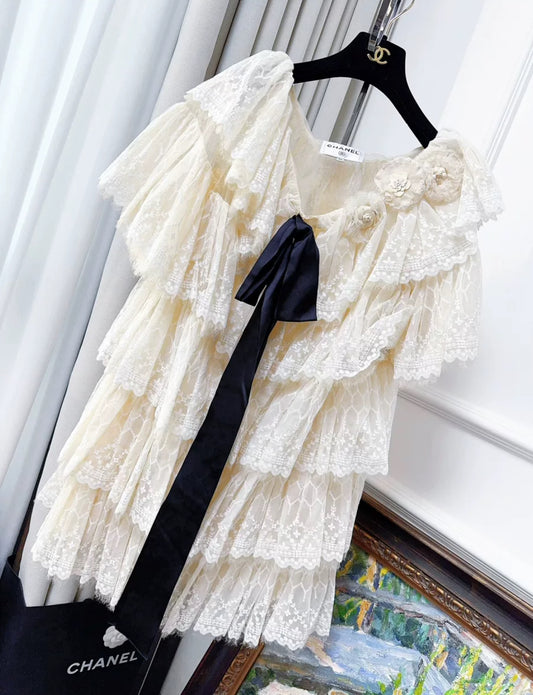 Chanel 16k Lace ecru dress with black bow