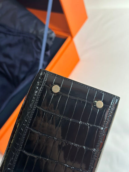 Hermès Kelly Midas 25 Noir Shiny Crocodile Porosus 18k yellow gold hardware & handle