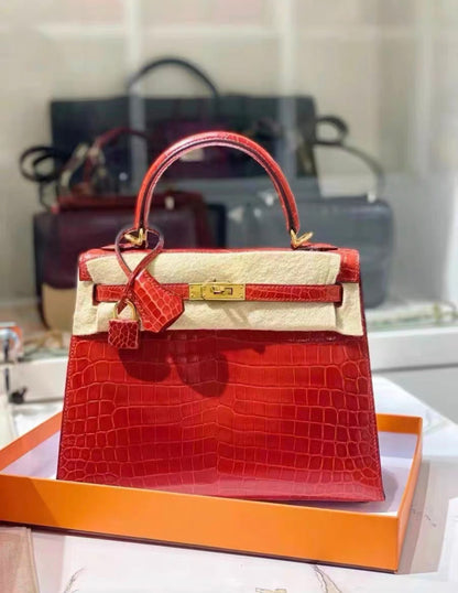 Hermès Kelly Sellier 25 Braise Shiny Porosus Crocodile Gold Hardware