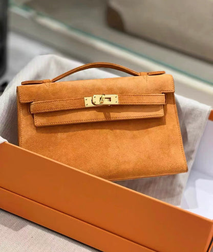 HERMES Veau Doblis Kelly Pochette Orange