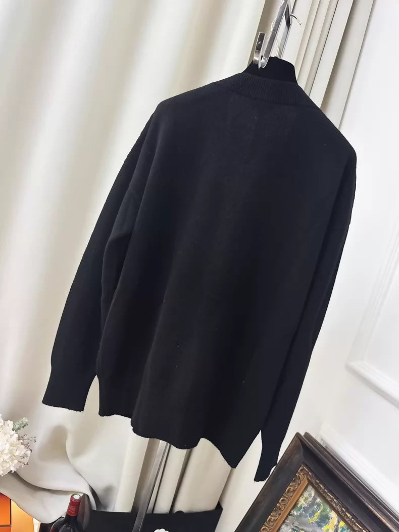Chanel 23C Black Knit Cardigan with Embroidered Number 5 Badge