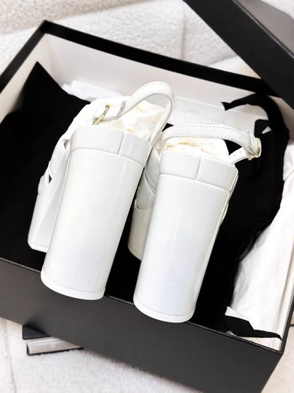 Chanel 23A white patent leather platform pumps