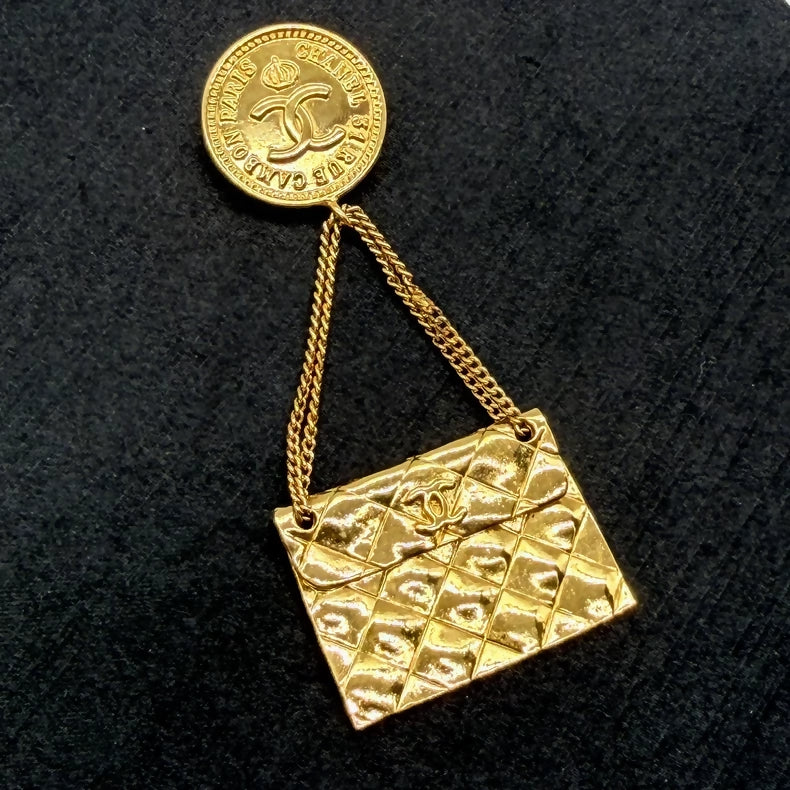 Chanel gold CF bag pendant brooch