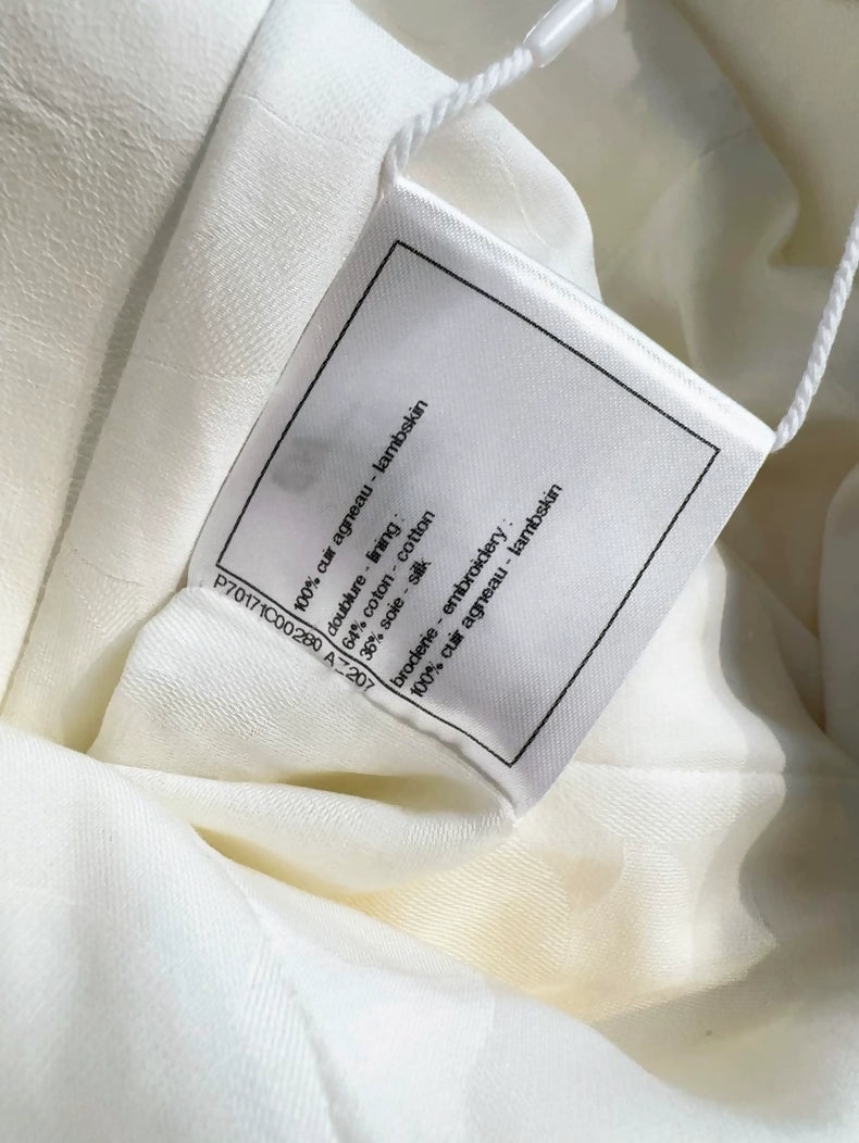 Chanel 21C Off-White Lambskin Leather Jacket with Black Trim
