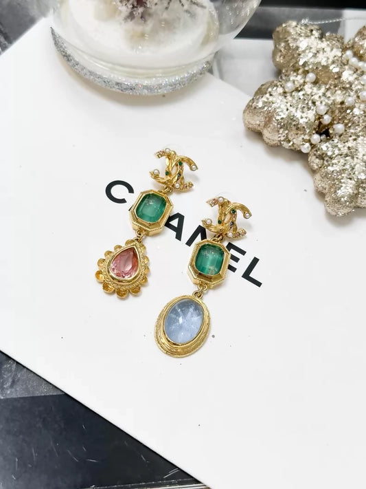 Chanel Fall/Winter 2020 gold double C logo earrings with colorful gemstones
