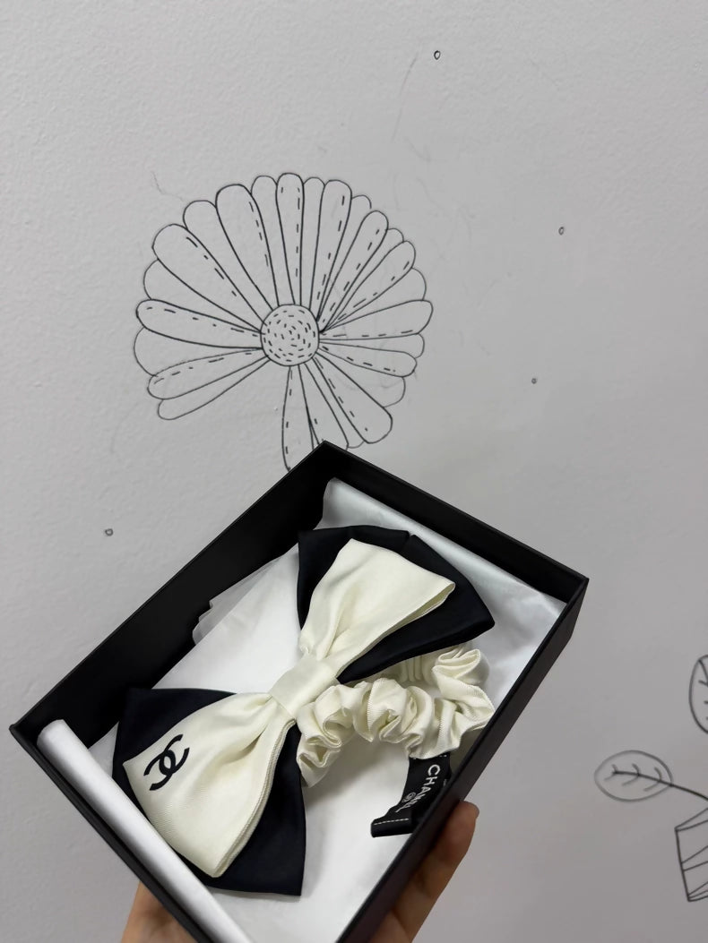 Chanel bow hair tie black and white
