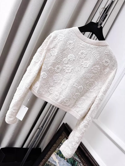 Chanel 21S  off-white knit cardigan with heavy embroidery, sequined camellia