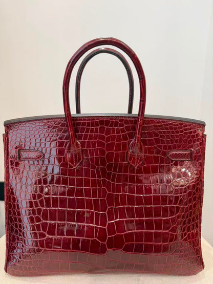 Rare Hermes Birkin 35 shiny Porosus Bordeaux Shiny Porosus Crocodile leather Gold hardware
