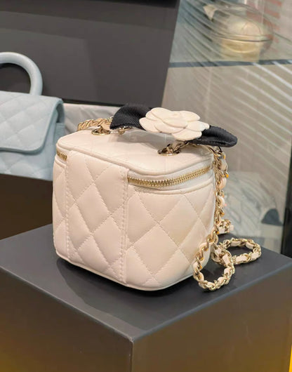 CHANEL Lambskin Quilted Small Camellia Bow Vanity Case With Chain