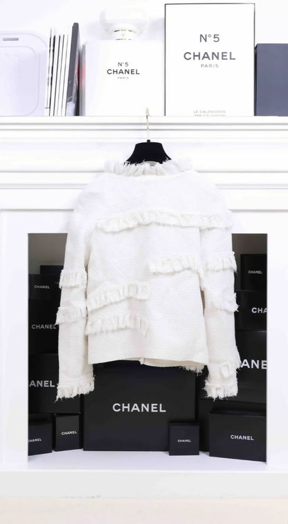 Chanel 2014 off white tweed jacket.