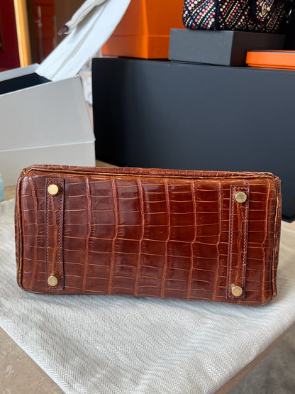 Hermès Birkin 25 Miel shiny porosus crocodile gold hardware