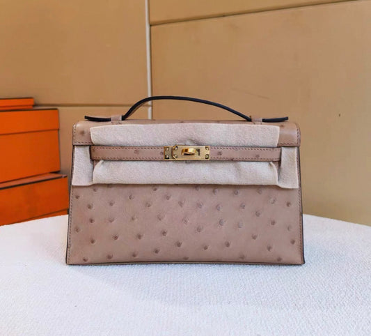 HERMÈS Kelly Pochette Chai Matte Ostrich Leather Gold Hardware