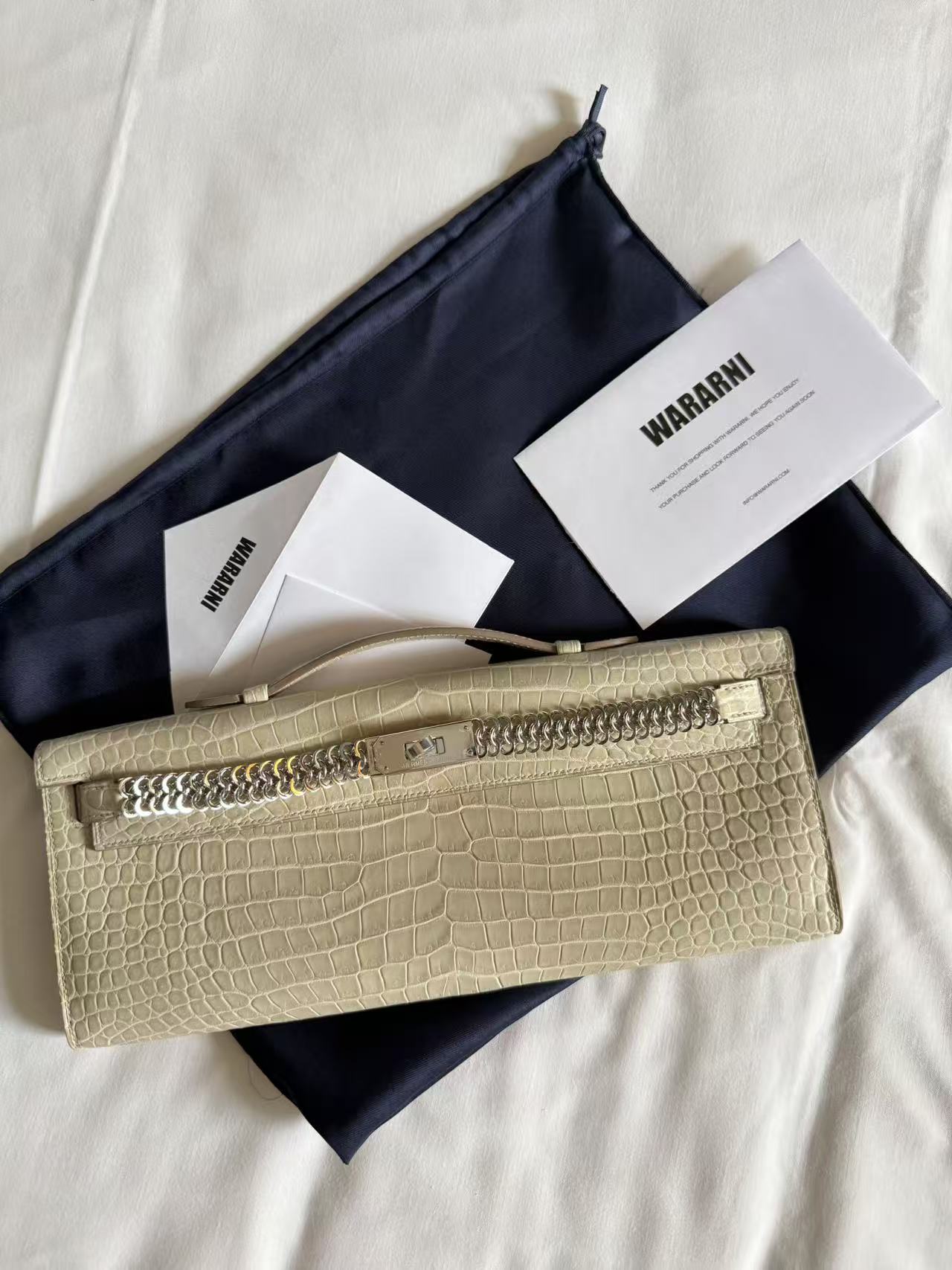 Hermes Kelly cut Unchained Beton Matte Porosus White Gold hardware