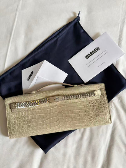 Hermes Kelly cut Unchained Beton Matte Porosus White Gold hardware