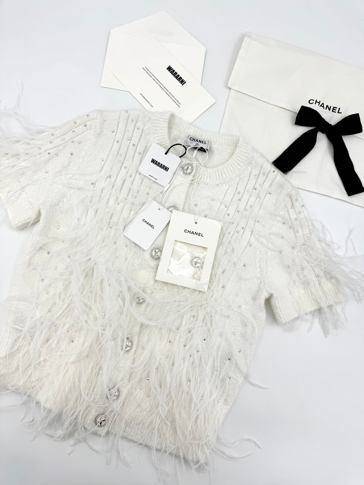 Chanel 25S white feather cardigan