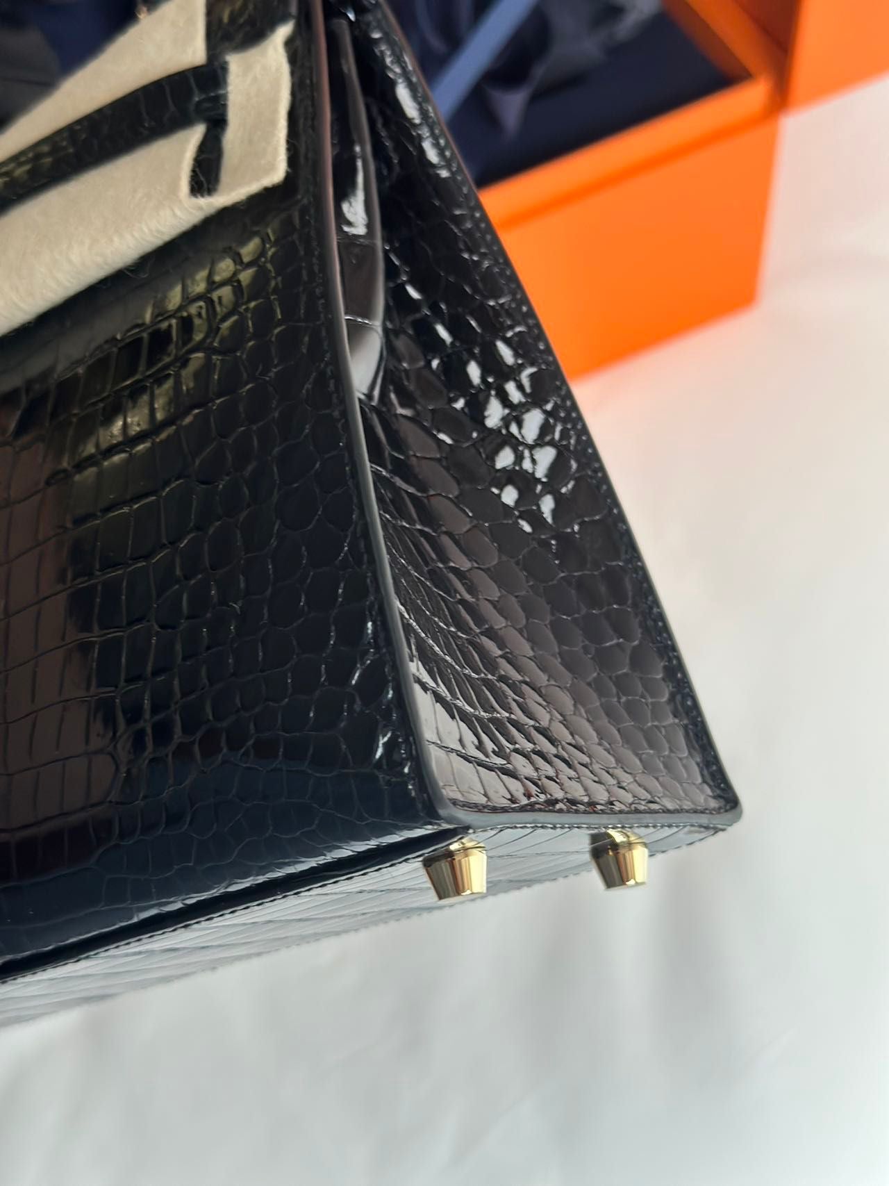 Hermès Kelly Midas 25 Noir Shiny Crocodile Porosus 18k yellow gold hardware & handle