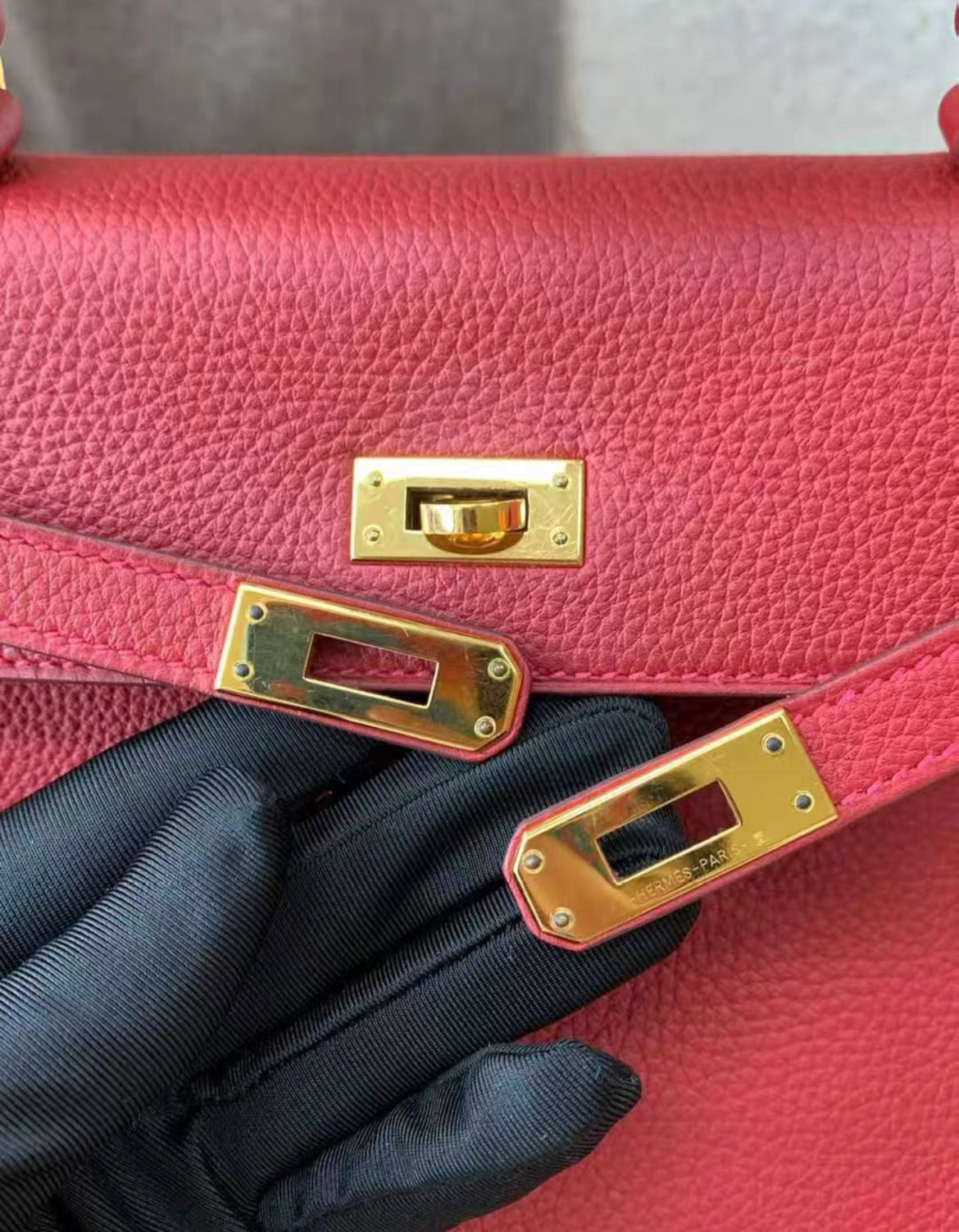 HERMES KELLY 25 RETOURNE ROUGE VIF TOGO GOLD HARDWARE