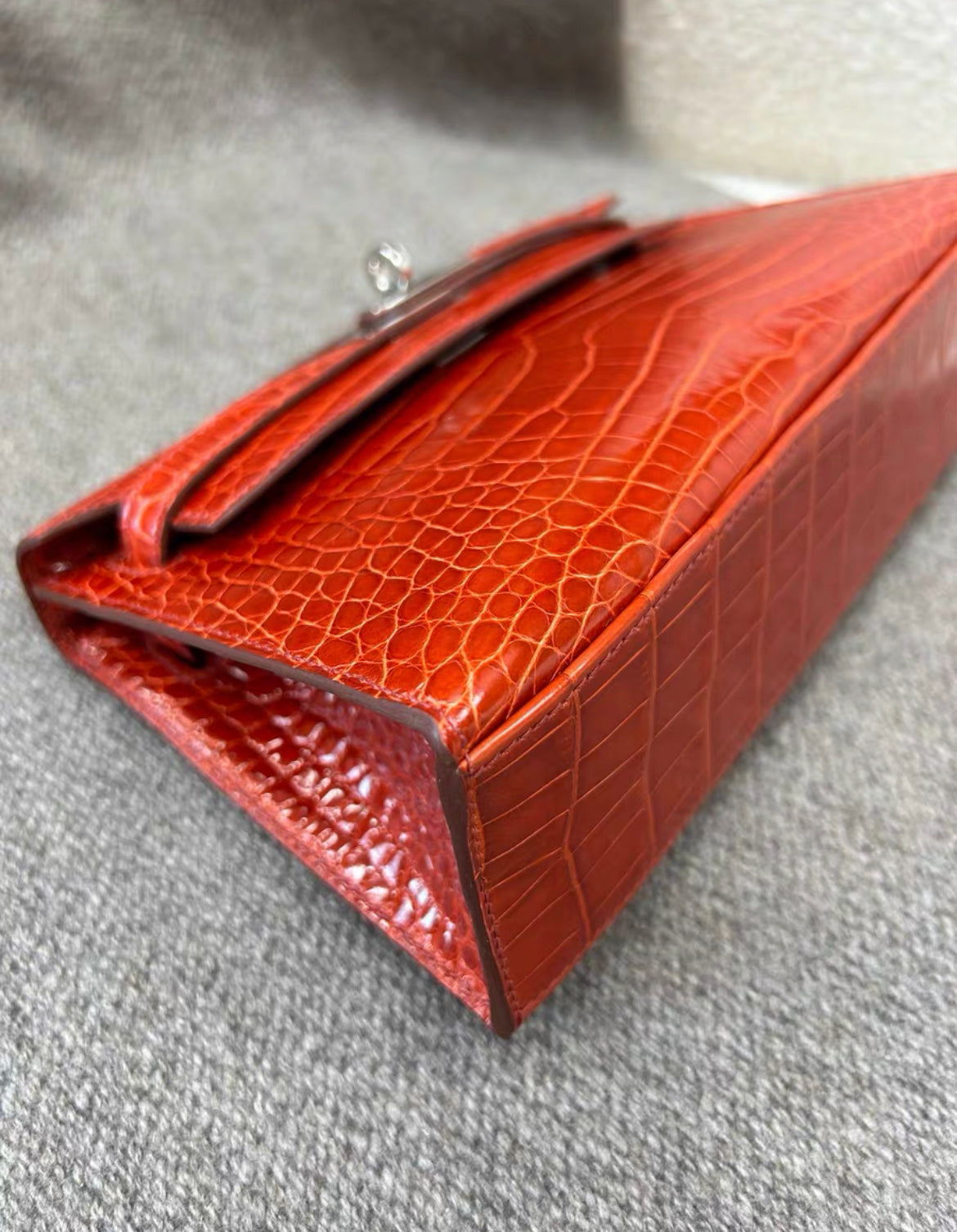 Hermès Kelly Pochette Braise Red Shiny Alligator Palladium